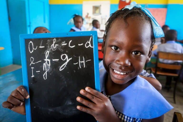 Finances dod this, child in haiti learning.